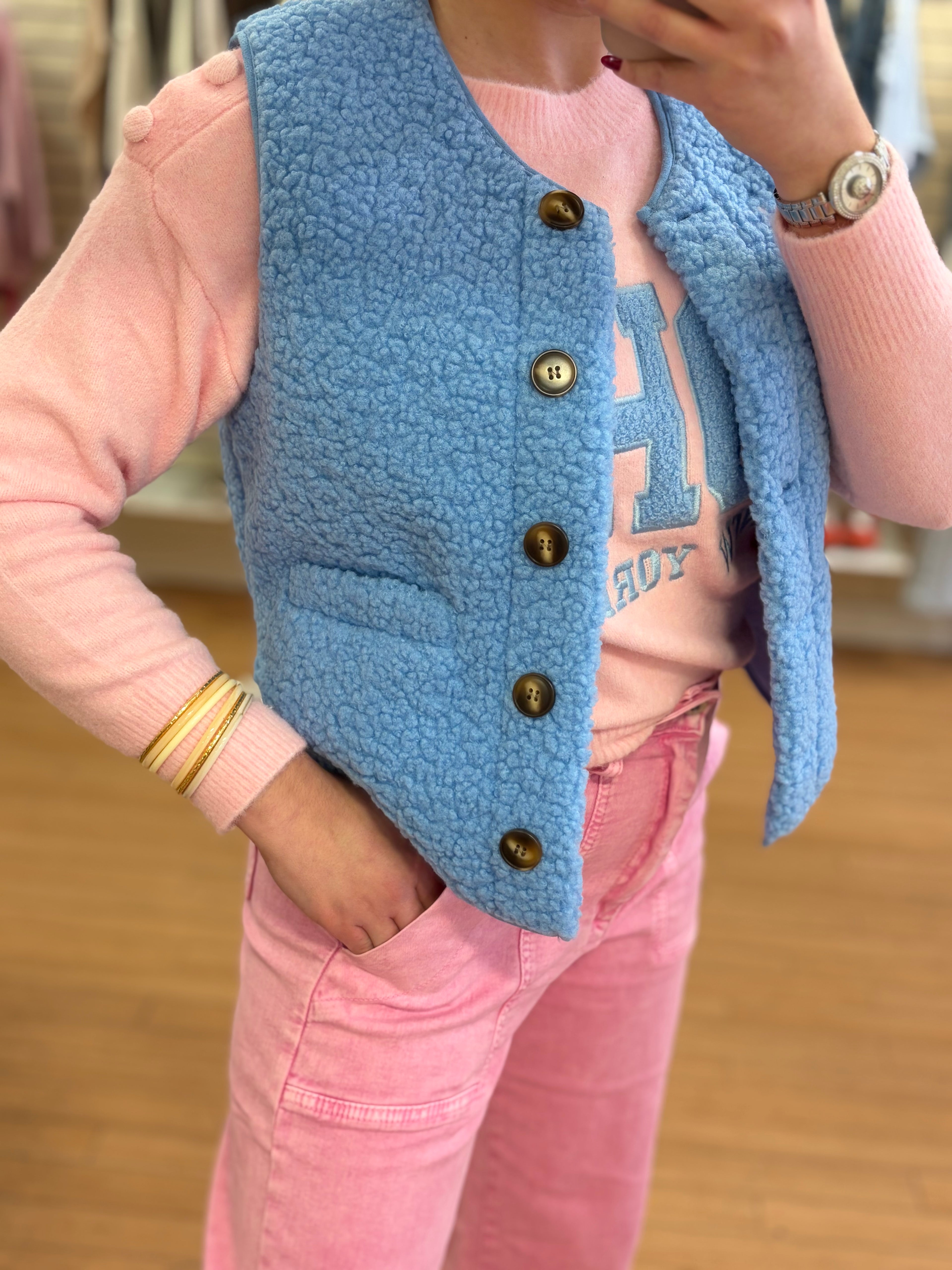 Veste bouclettes sans manches